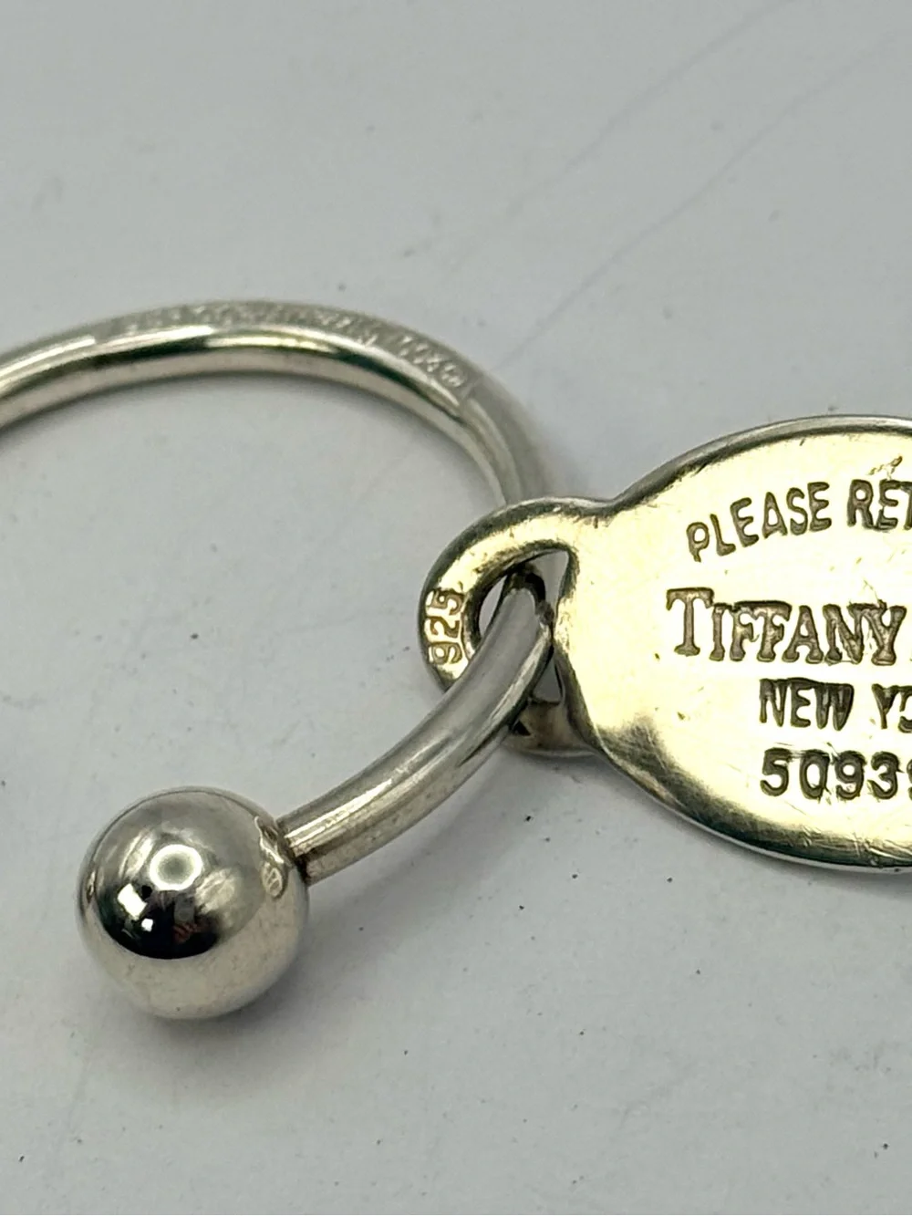 Tiffany & Co. Sterling Silver 'Please Return' Oval Tag Key Ring - Silver Large